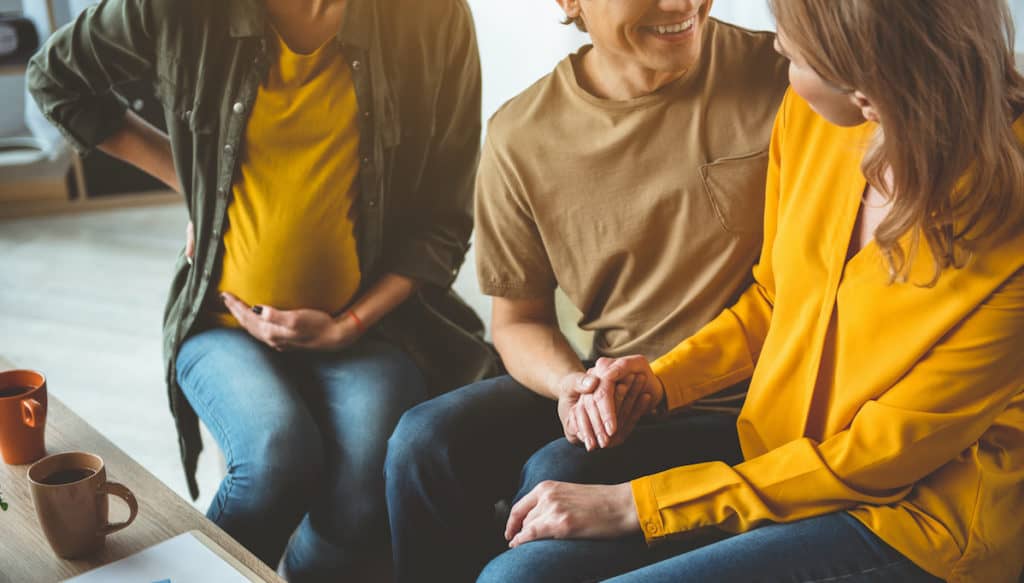 adoptive family is happy for birth mother of pregnant adoptee