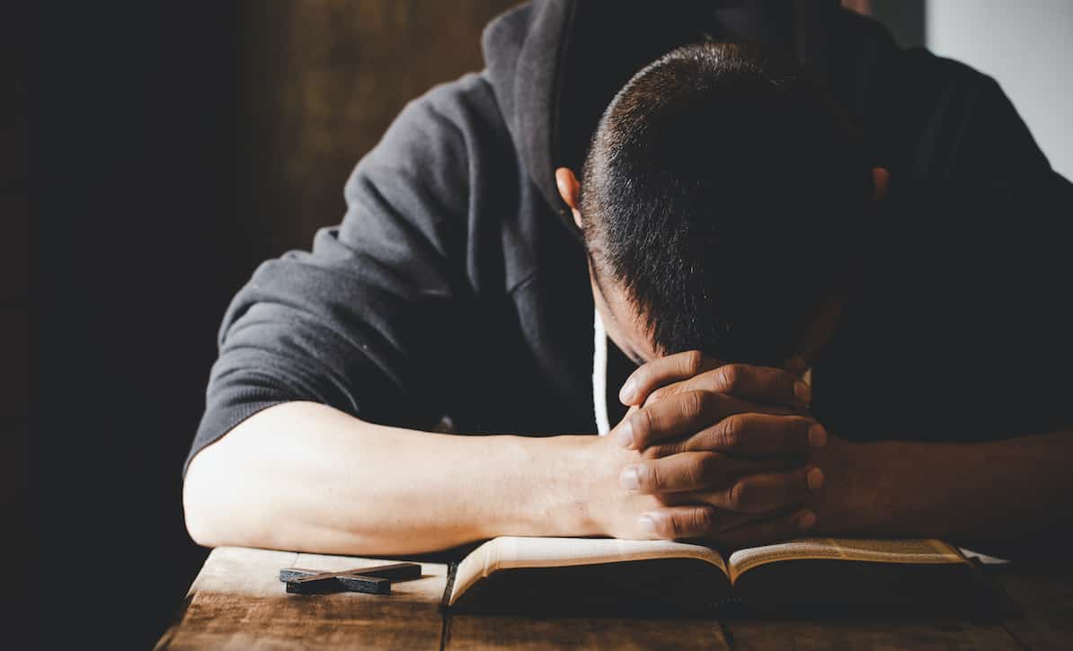 A young christian man prays against Christian abortion and how men feel about abortion.